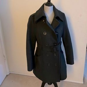 Women’s wool long pea-coat, with belt.